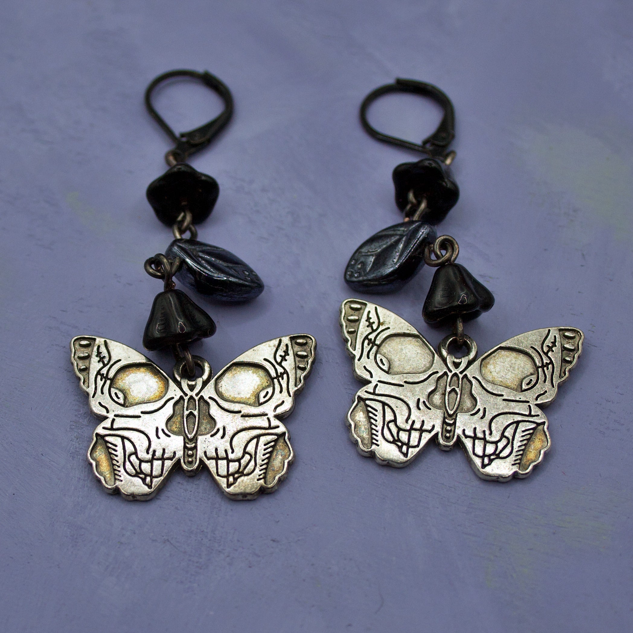 Butterfly skull flower earrings